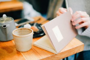 Taking notes in a diary